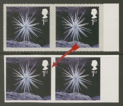 2003 1st Class Christmas stamp, where the background MATRIX is not removed from between the stamp, at a glance, looks Im…